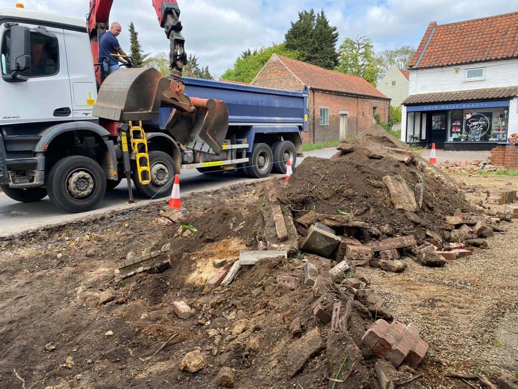 This is a photo of a dig out being carried out for the installation of a new tarmac driveway. Works being carried out by Worlingworth Driveway Solutions