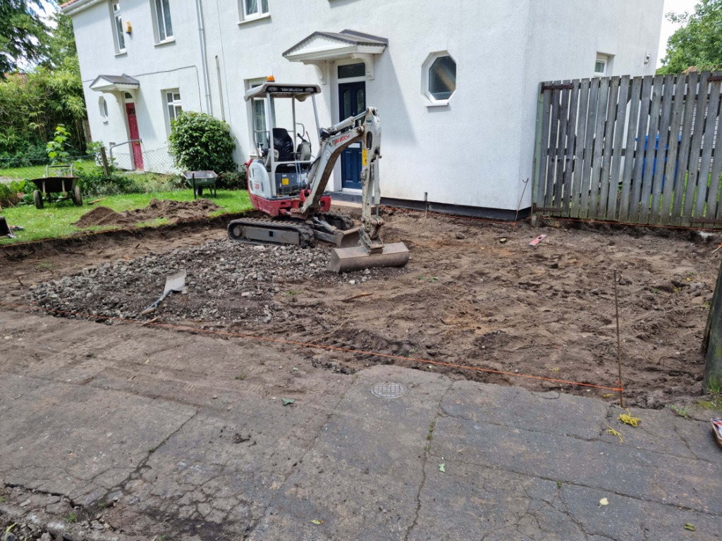 This is a photo of a dig out being carried out by Worlingworth Driveway Solutions in preparation for a block paving driveway